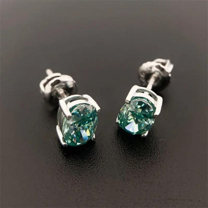 0.32Ct Oval Emerald Solitaire Studs Earring in White Gold