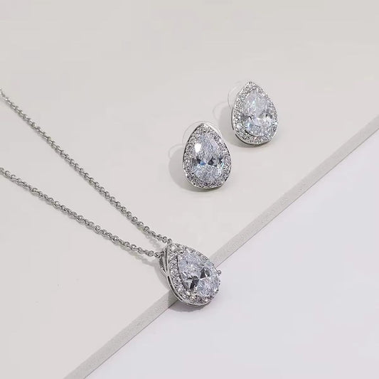 Lab Grown Diamond 0.10Ct Pear Solitaire Halo Pendant Necklace in White Gold