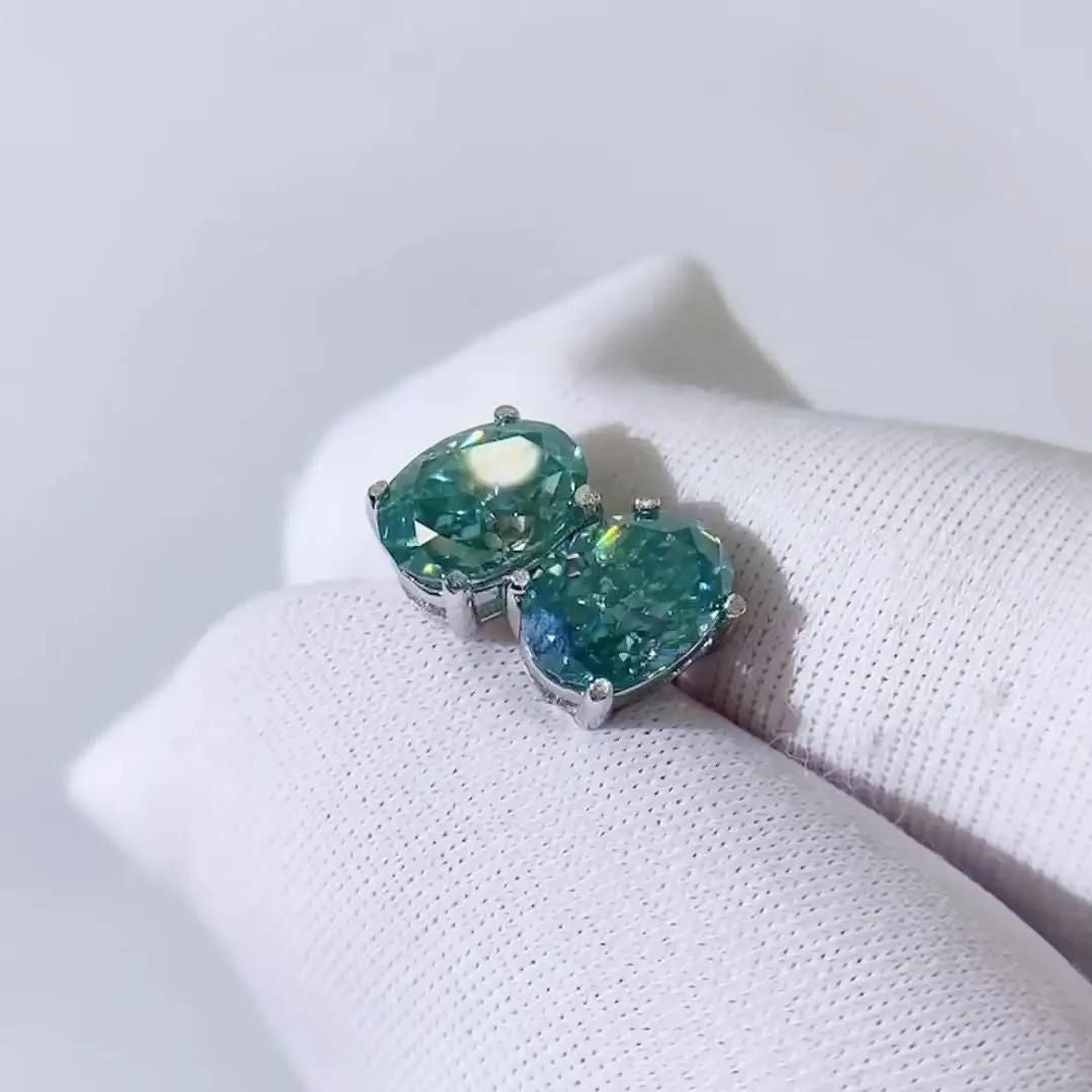 0.30Ct Oval Emerald Solitaire Studs Earring in White Gold