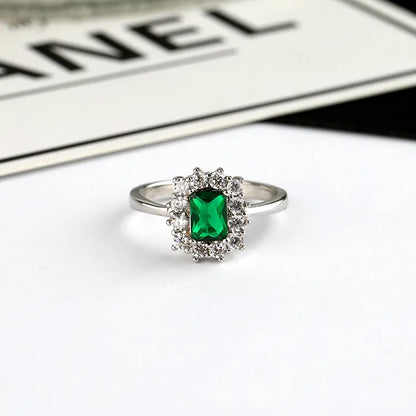 1.50 Carat Emerald and Natural Diamond Cluster Ring