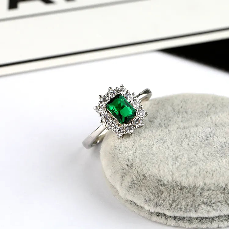 1.50 Carat Emerald and Natural Diamond Cluster Ring